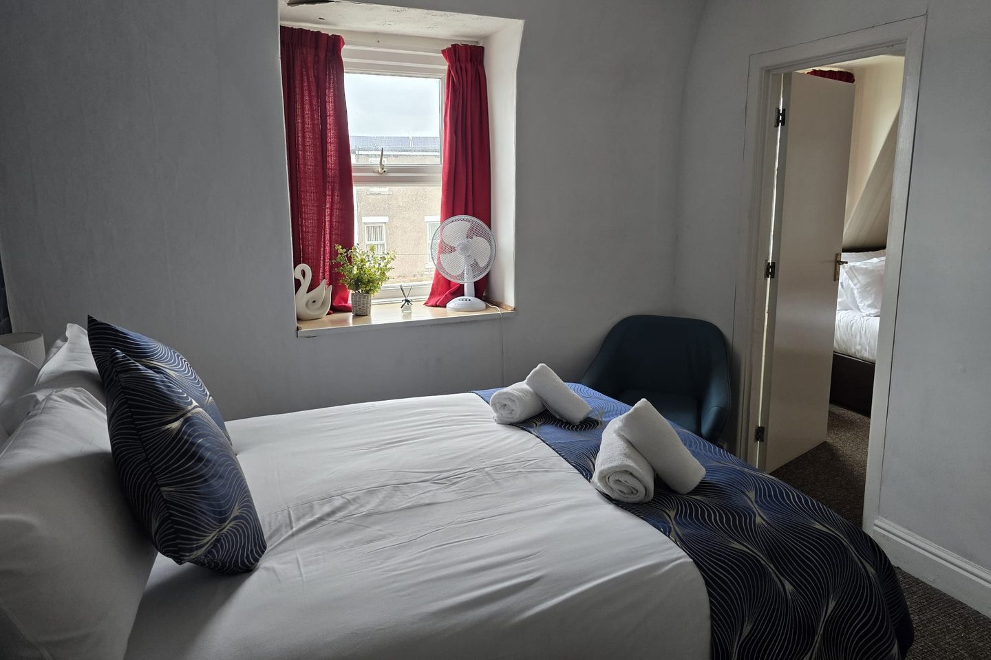 Family Suite showing the open doorway connecting the double room to the second bedroom